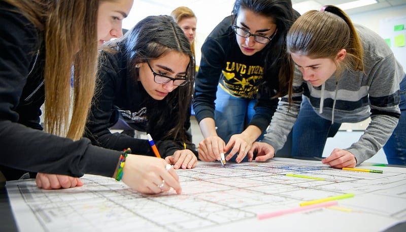 Students collaborating on an innovative project funded by Tinker Grants